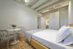 Postel nebo postele na pokoji v ubytování Agriturismo Biancarda + 37 fotografií