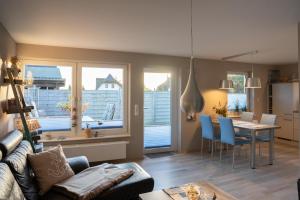 Posezení v ubytování Ferienhaus Savannah-Blue