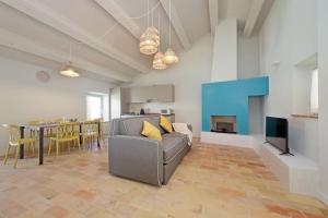 TV a/nebo společenská místnost v ubytování Agriturismo Biancarda