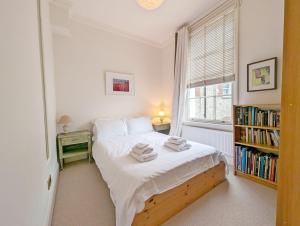 Ένα ή περισσότερα κρεβάτια σε δωμάτιο στο 4 The Clockhouse , Midhurst