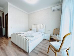 Voodi või voodid majutusasutuse Armenia Hotel toas