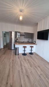 Kuchyň nebo kuchyňský kout v ubytování Home away Home