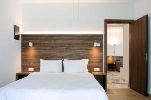 Posteľ alebo postele v izbe v ubytovaní Thess1home Grand Mistral