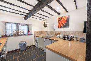 Køkken eller tekøkken på The Farmhouse at Thompson Ground