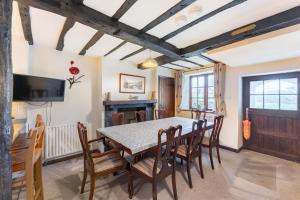 Et tv og/eller underholdning på The Farmhouse at Thompson Ground