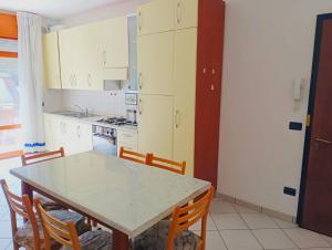 Kuchyň nebo kuchyňský kout v ubytování Fides Apartment
