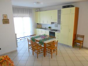 Kuchyň nebo kuchyňský kout v ubytování Fides Apartment
