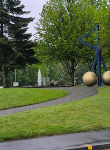 a blue sculpture in the middle of a park at Snugly Studio Flat near Talbot Pub in Birmingham