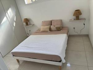 Ένα ή περισσότερα κρεβάτια σε δωμάτιο στο Villa Noo La