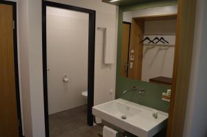 Kúpeľňa v ubytovaní Business Motel Feldkirch
