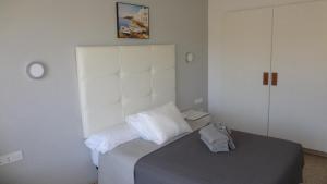 Postel nebo postele na pokoji v ubytování Hotel Carlos I