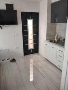 Kuchyň nebo kuchyňský kout v ubytování Lela lux