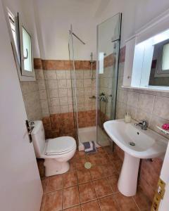 Vannituba majutusasutuses ClaudiAgapi Apartments Korfu