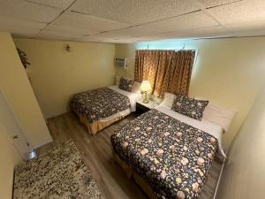 Postel nebo postele na pokoji v ubytování Searay - Motel