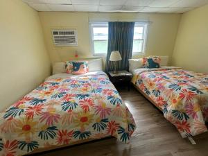 Postel nebo postele na pokoji v ubytování Searay - Motel
