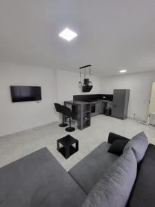 TV a/nebo společenská místnost v ubytování Ferienhaus Eichen