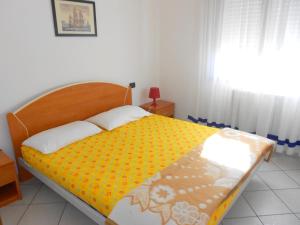 Postel nebo postele na pokoji v ubytování Fides Apartment