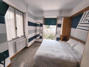A bed or beds in a room at Residence Corallo