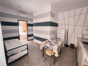 A bed or beds in a room at Residence Corallo