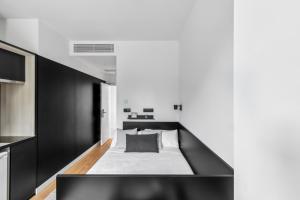 Postel nebo postele na pokoji v ubytování Home and CoLiving Pamplona