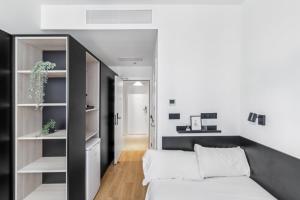 Postel nebo postele na pokoji v ubytování Home and CoLiving Pamplona