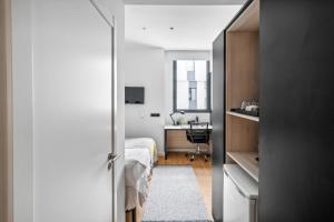 Postel nebo postele na pokoji v ubytování Home and CoLiving Pamplona