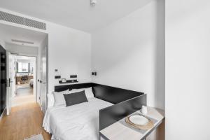 Postel nebo postele na pokoji v ubytování Home and CoLiving Pamplona