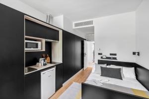 Kuchyň nebo kuchyňský kout v ubytování Home and CoLiving Pamplona