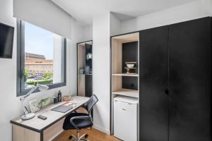 Kuchyň nebo kuchyňský kout v ubytování Home and CoLiving Pamplona
