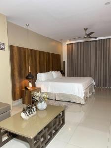 Hotel Santorini Loft客房内的一张或多张床位