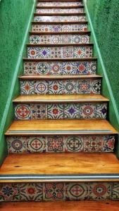 a set of stairs with tiles on them at Rio Deal Guest House in Rio de Janeiro