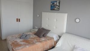 Postel nebo postele na pokoji v ubytování Hotel Carlos I