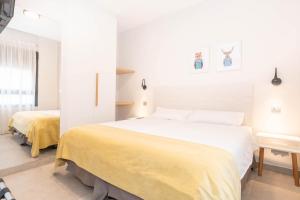Postel nebo postele na pokoji v ubytování Sholeo Lodges Santa Catalina Flats