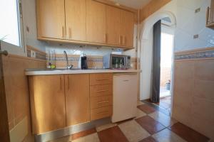Kuchnia lub aneks kuchenny w obiekcie Atico Jimena Granada en el centro de Nerja