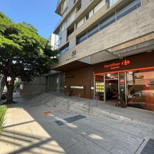 a store front of a building with stairs in front at VN Melo Alves in Sao Paulo