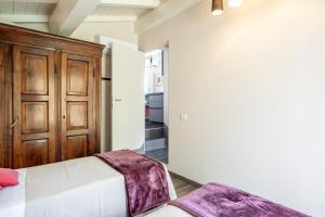 Postel nebo postele na pokoji v ubytování Casa Lu