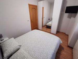 Postel nebo postele na pokoji v ubytování Appartamento Casa Corrada