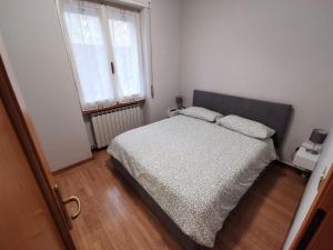 Postel nebo postele na pokoji v ubytování Appartamento Casa Corrada