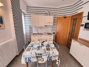 A television and/or entertainment centre at Residence Corallo