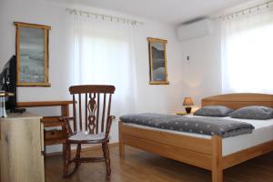 Posteľ alebo postele v izbe v ubytovaní Vacation House Home, Plitvice Lakes National Park