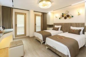 Postel nebo postele na pokoji v ubytování Safa Hotel Old City