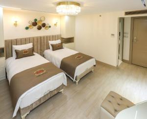 Postel nebo postele na pokoji v ubytování Safa Hotel Old City