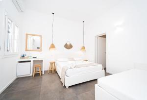 Postel nebo postele na pokoji v ubytování Salento Boutique Suite