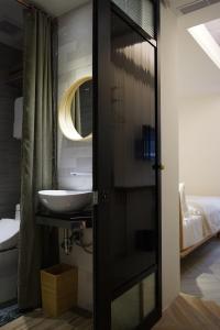 Voodi või voodid majutusasutuse NiHao Café Hotel toas