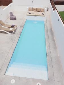 Bazén v ubytování Sun Sea villa-heated pool nebo v jeho okolí
