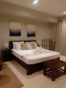 Katil atau katil-katil dalam bilik di Beach Front by Kay Jay