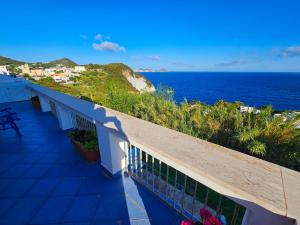 a balcony with a view of the ocean at Maridea - Le Signore del Vento in Ponza +21 photos