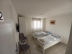 Postel nebo postele na pokoji v ubytování SOBE CICKO + 4 fotografie