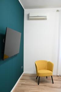 TV a/nebo společenská místnost v ubytování HOSTia