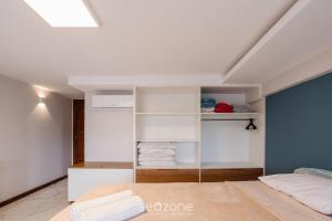 a bedroom with a bed in a room at CPR - Apartamentos a 200m da praia com Piscina in Marau